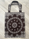 Brown bandana bag with white paisley print